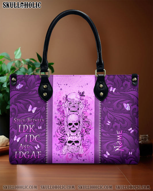 STUCK BETWEEN IDK IDC AND IDGAF LEATHER HANDBAG - YHLN2703243