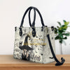 A WEE BIT WICKED HALLOWEEN LEATHER HANDBAG