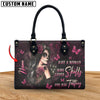 JUST A WOMAN WHO LOVES SKULLS LEATHER HANDBAG