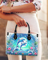 Dolphin Moon Floral Leather Handbag
