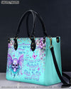 THE GOOD GIRL IN ME SKULL WINGS LEATHER HANDBAG - YHDU2803241
